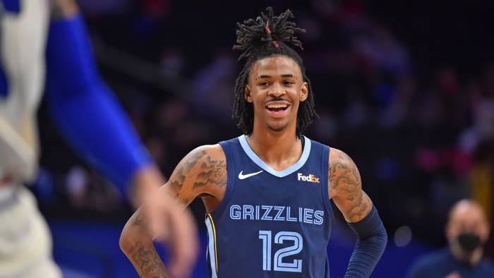 Ja Morant smiles during a game against the Philadelphia 76ers.