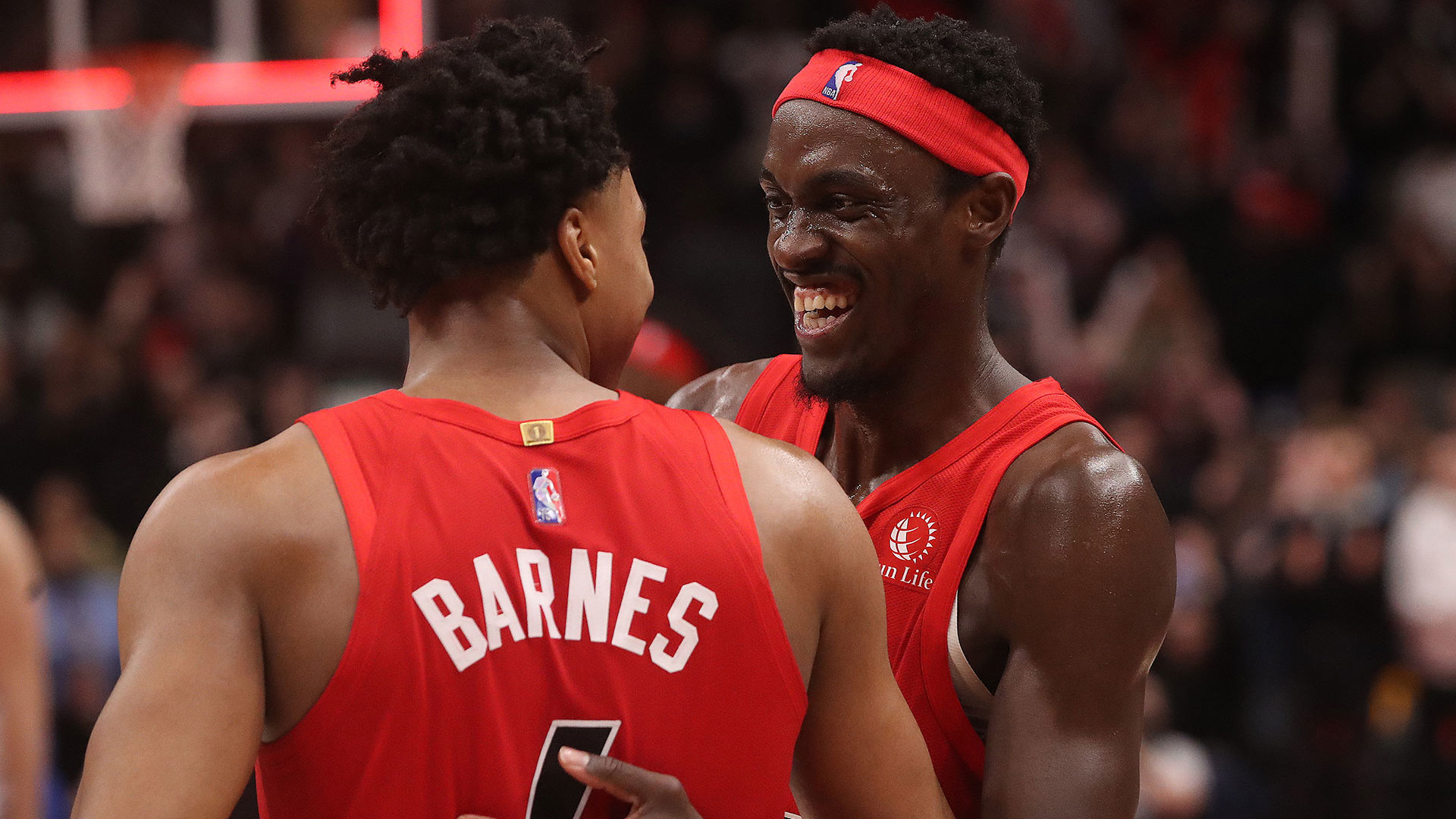 Toronto Raptors forward Scottie Barnes (4) and Toronto Raptors forward Pascal Siakam (43) celebrate