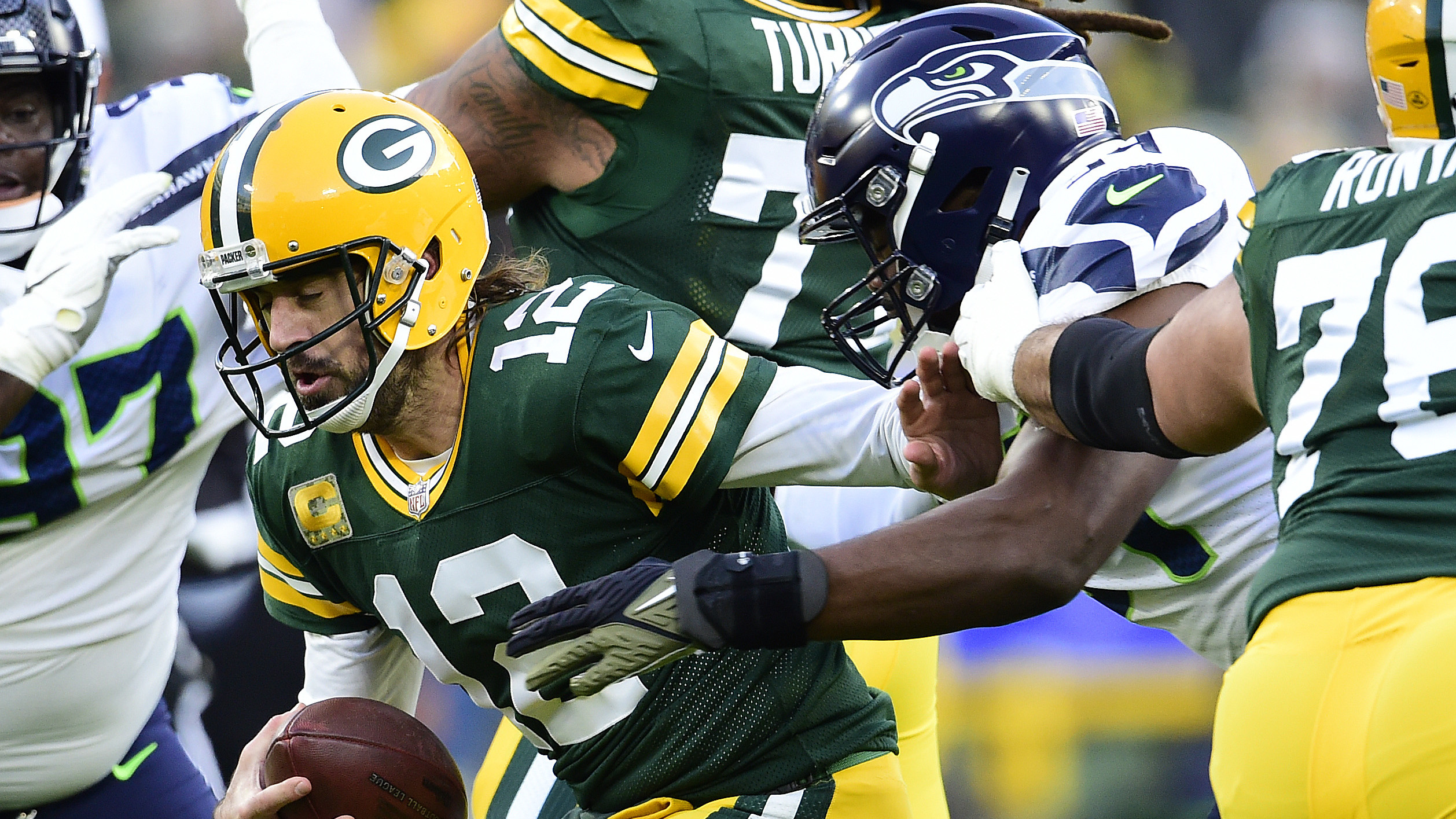 Aaron Rodgers playing against the Seattle Seahawks