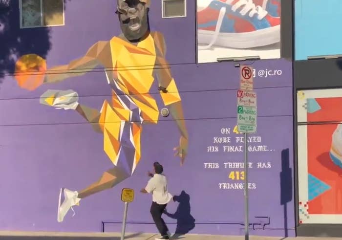 Lakers Fan Throws Shoe at Kobe/LeBron Mural