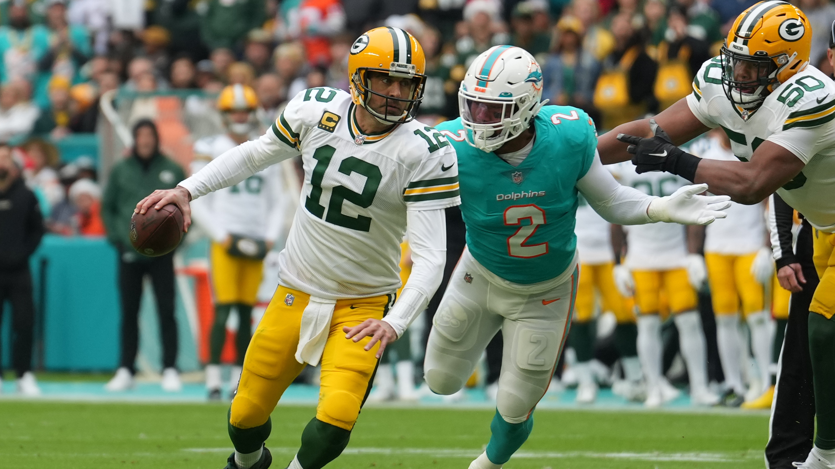 Aaron Rodgers playing against the Miami Dolphins