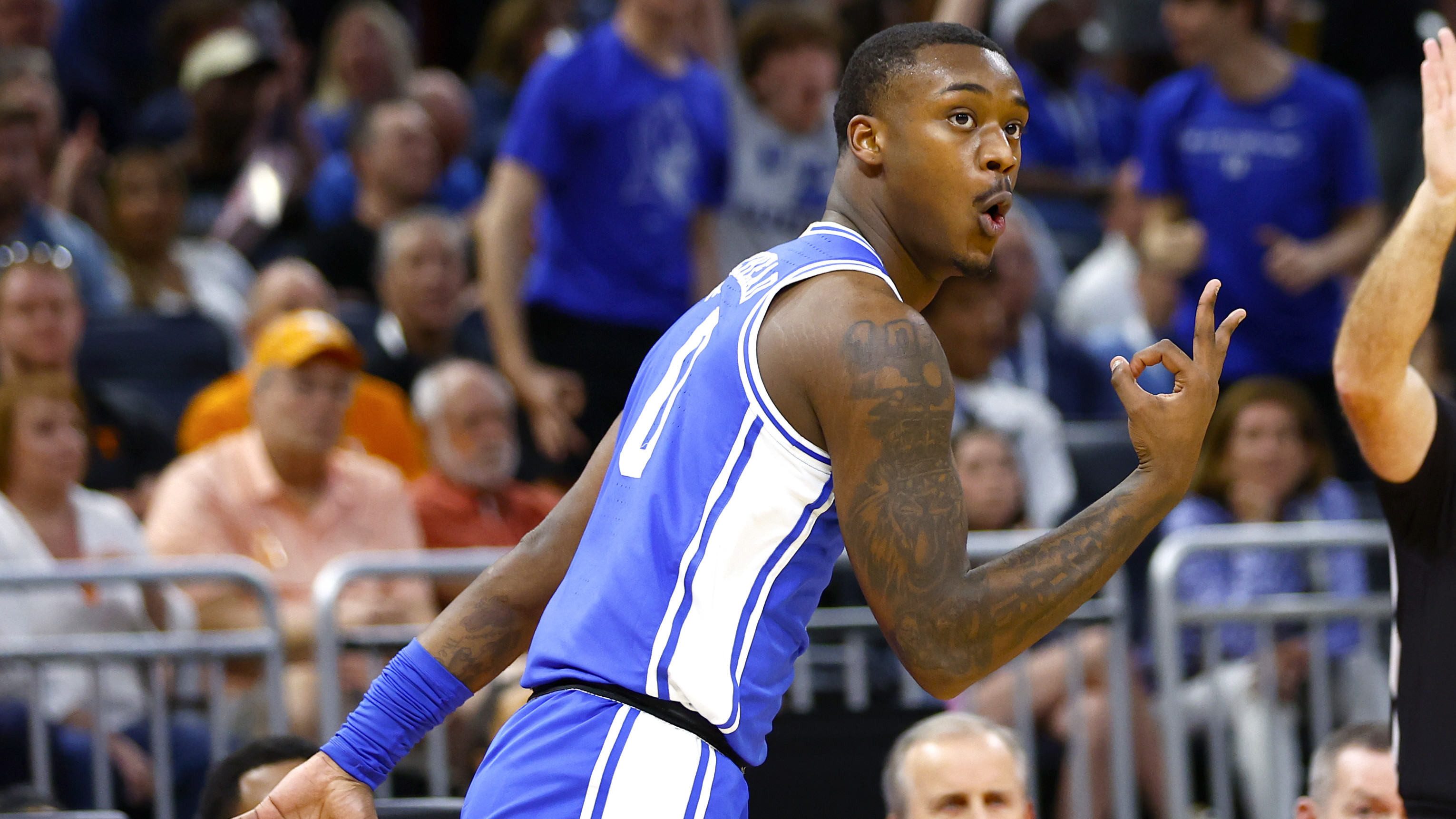 Dariq Whitehead celebrates a three for Duke in the NCAA Tournament