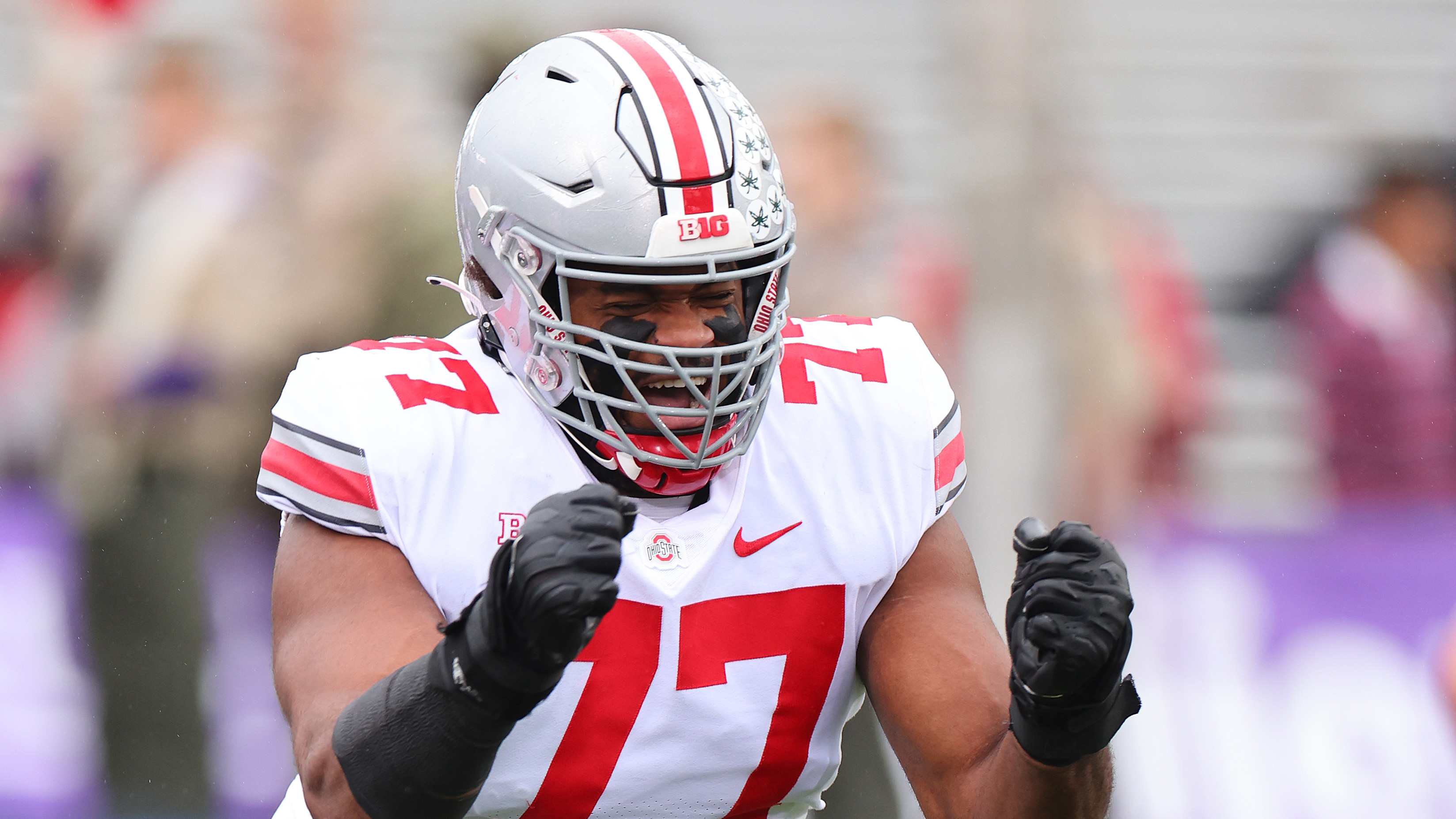 Paris Johnson Jr. #77 of the Ohio State Buckeyes in action against the Northwestern