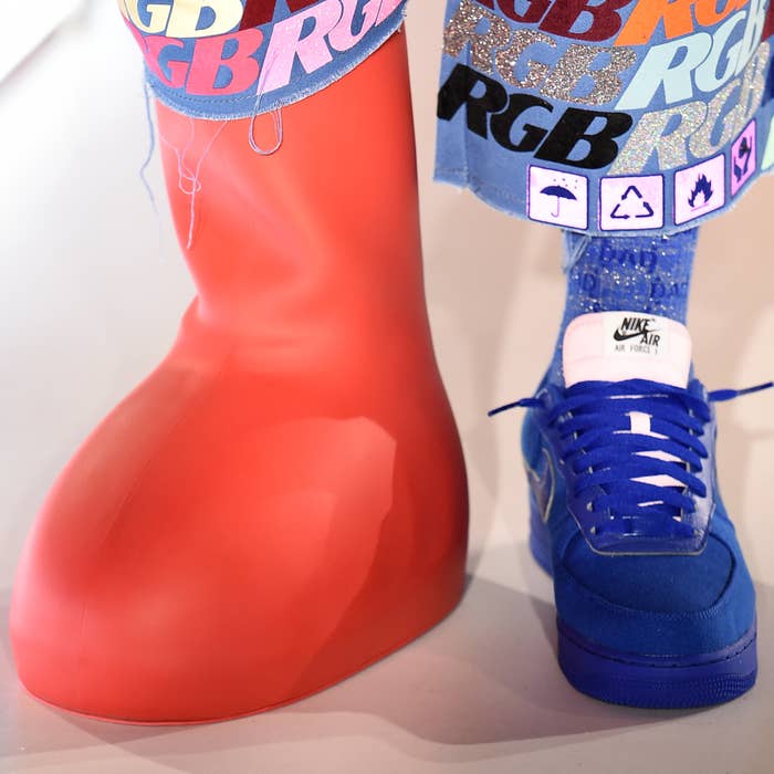 A model walks the runway wearing MSCHF&#x27;s Big Red Boot for ROY G BIV during New York Fashion Week.