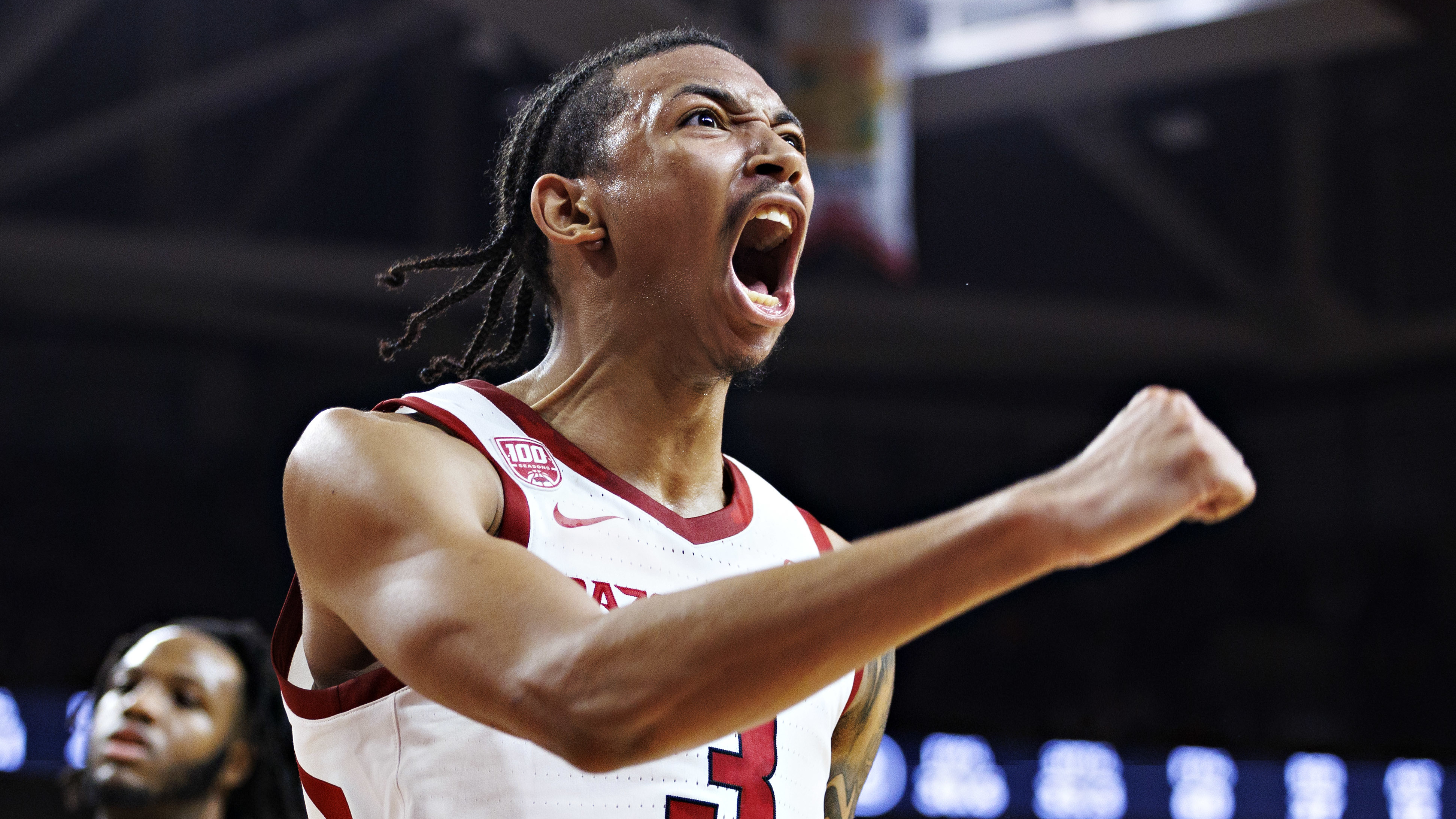 Nick Smith Jr celebrates a bucket at Arkansas