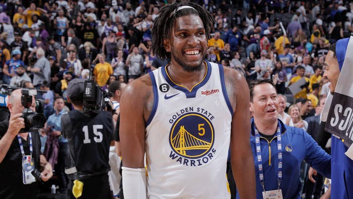 Kevon Looney smiles after defeating the Sacramento Kings during Round 1