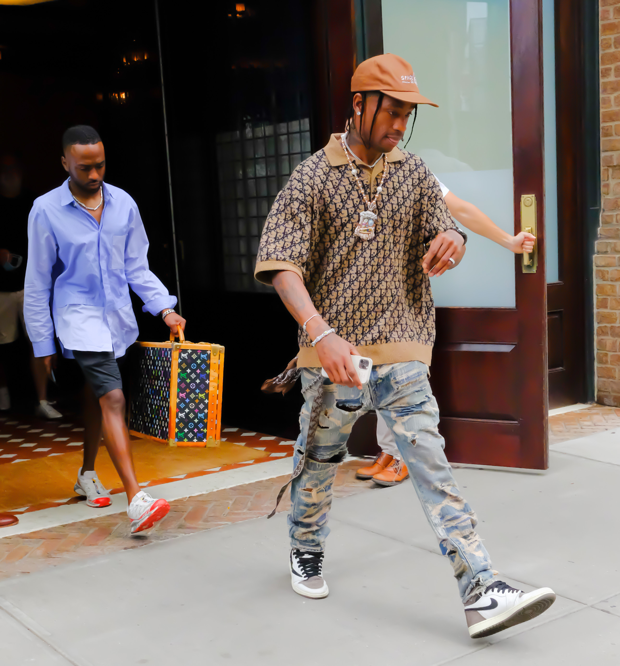 Travis Scott leaving hotel in Soho.