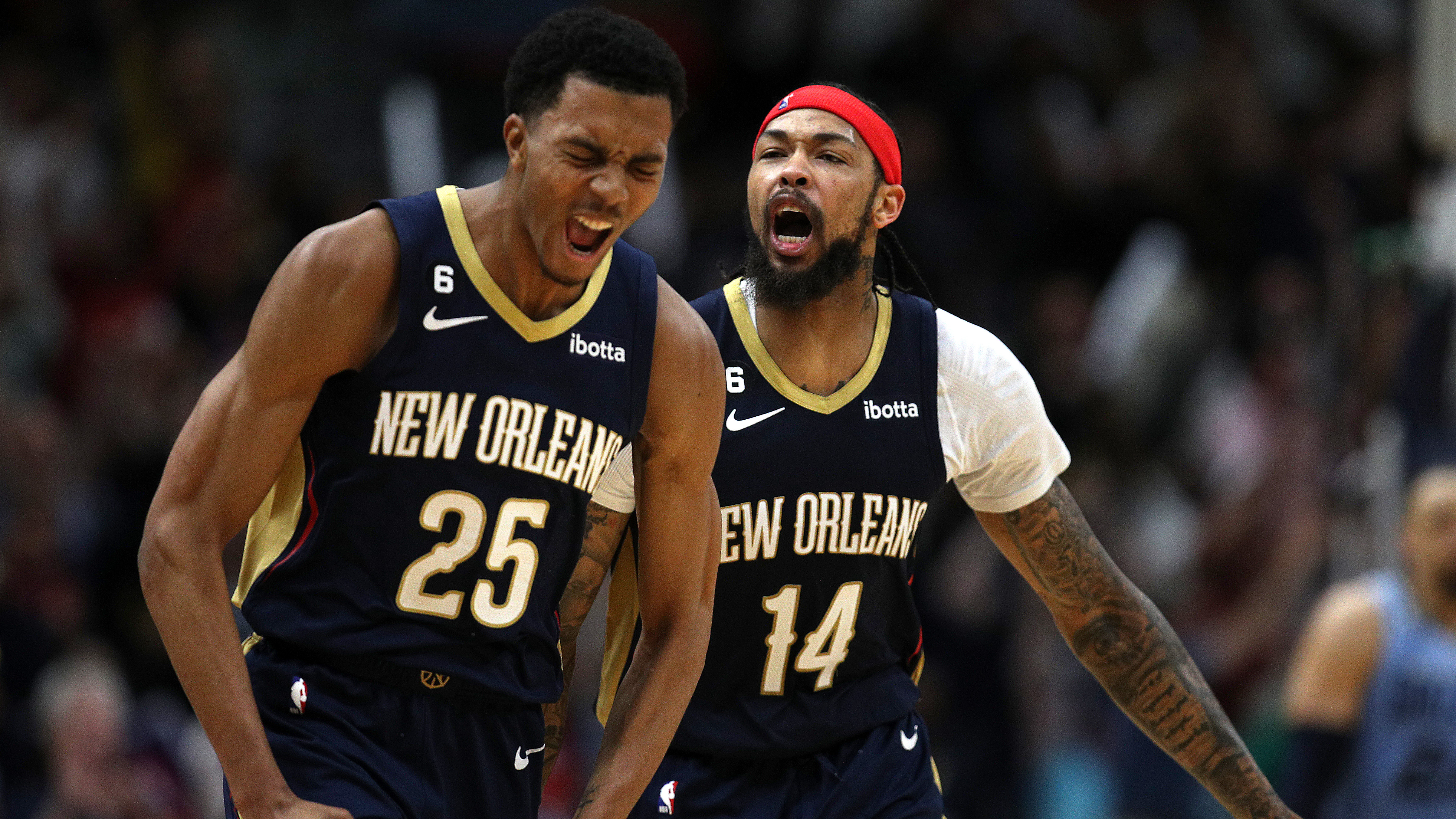 Trey Murphy and Brandon Ingram celebrating a bucket