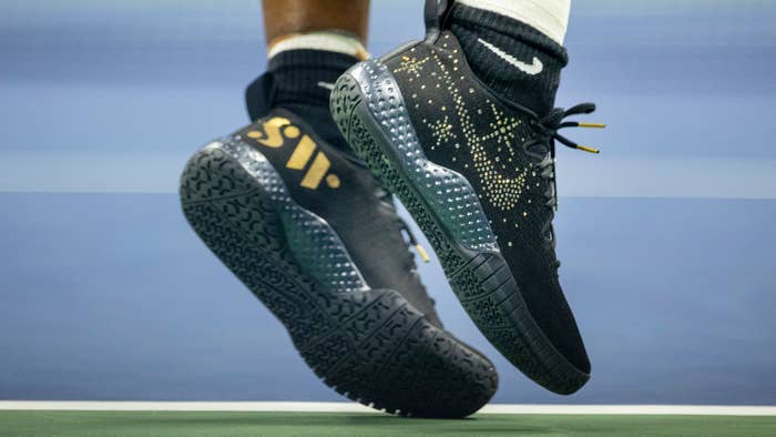 Serena Williams&#x27; black NikeCourt Flare 2 sneakers at the US Open 2022, which are encrusted with diamonds