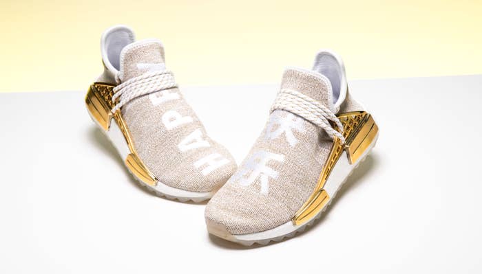 Pharrell Williams x Adidas NMD Hu China Exclusive &#x27;Happy&#x27; Gold F99762 (Front Pair)