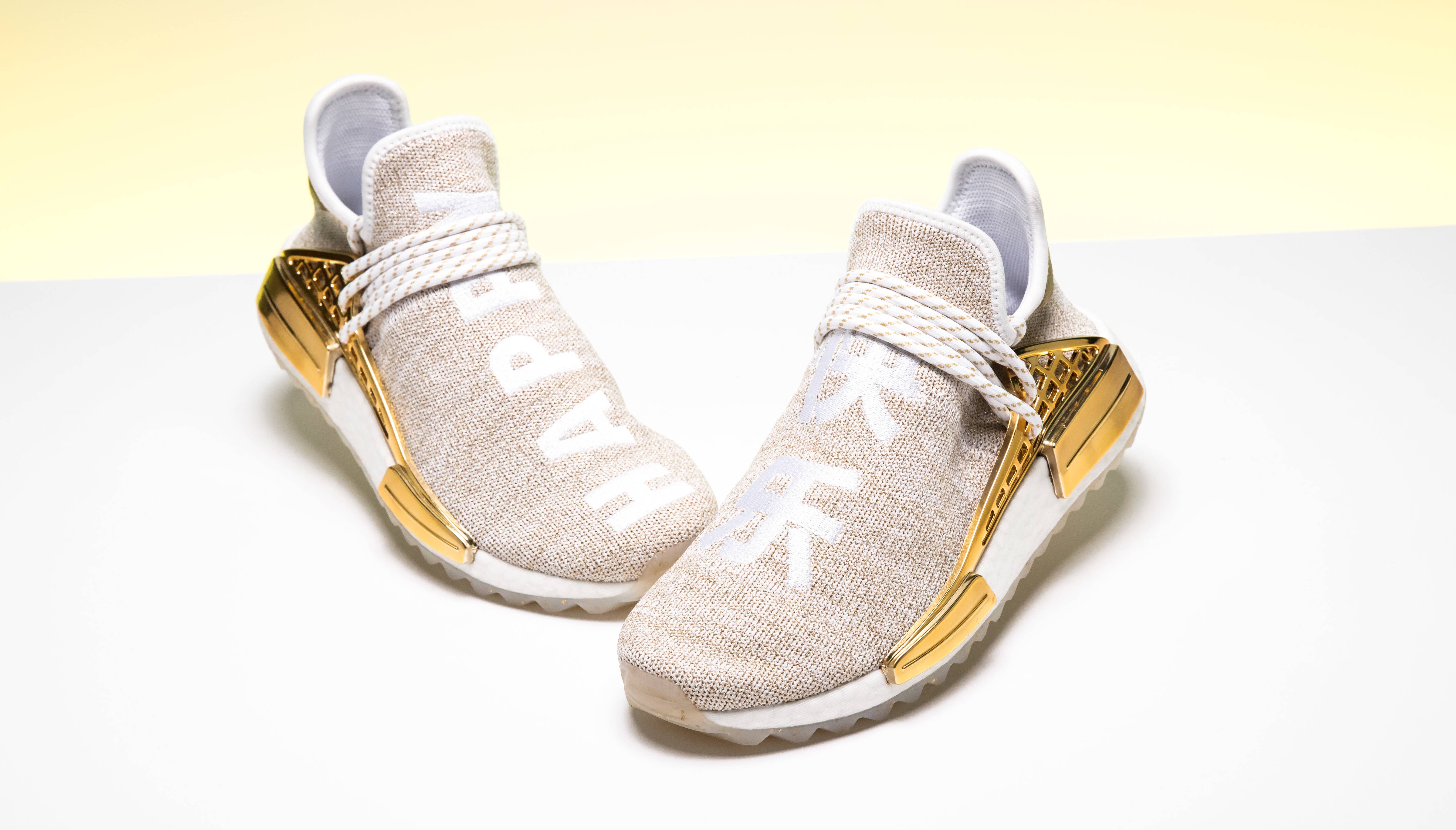 Pharrell Williams x Adidas NMD Hu China Exclusive 'Happy' Gold F99762 (Front Pair)