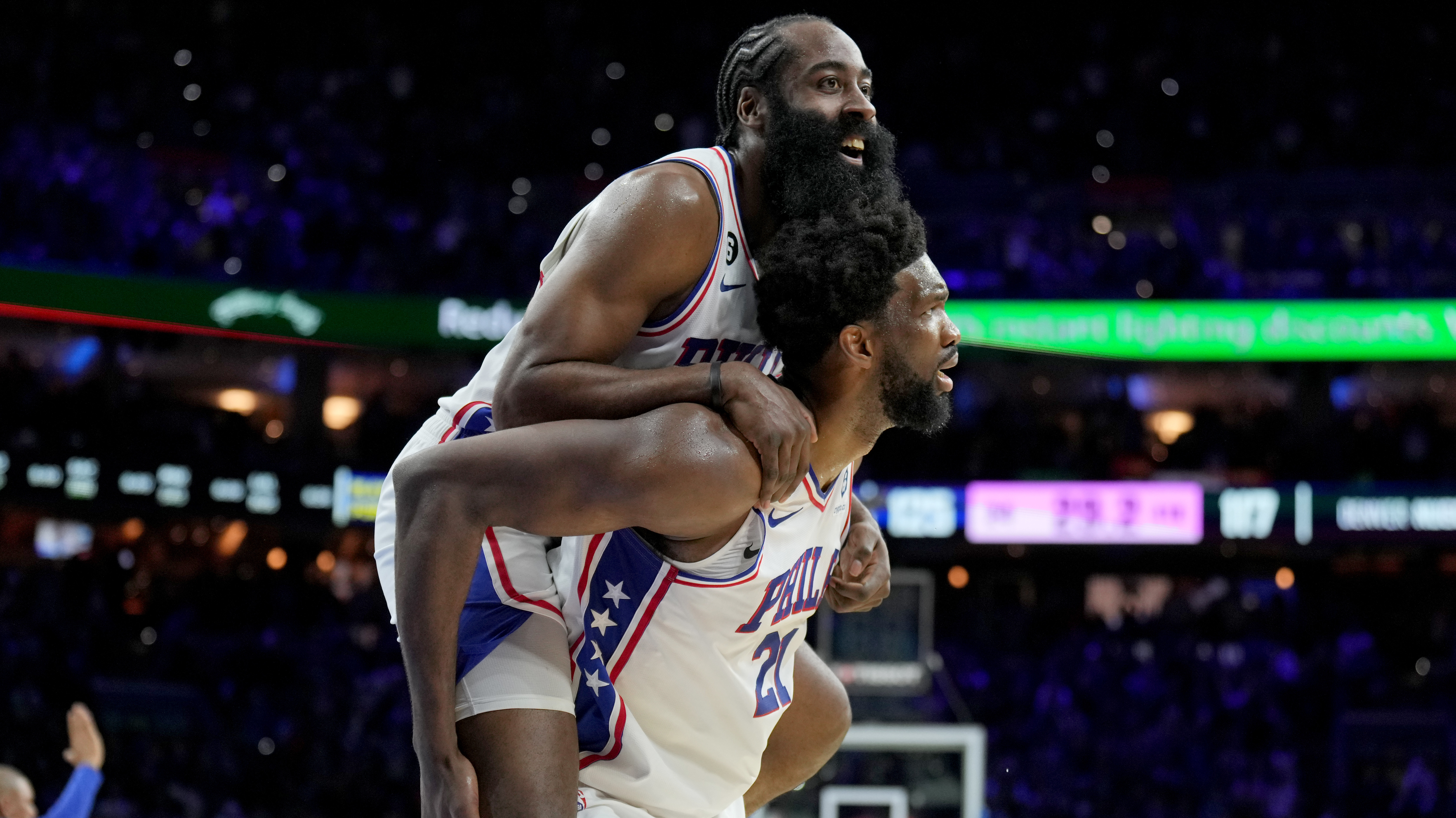 James Harden jumping on the back of Joel Embiid