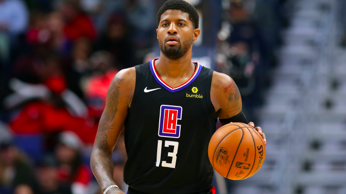 Paul George #13 of the LA Clippers reacts during a game
