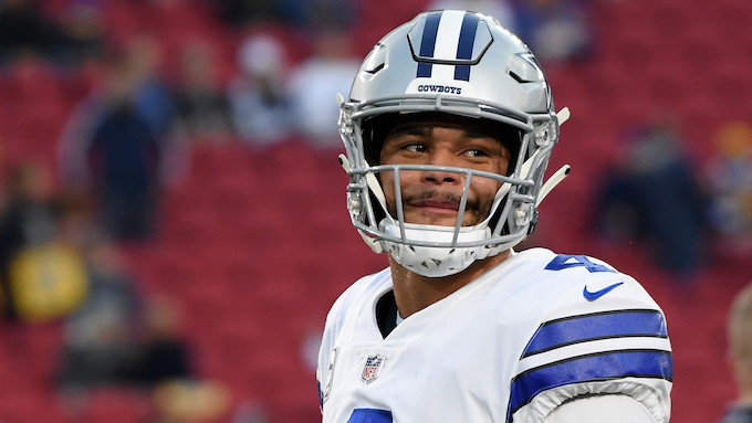 Dak Prescott warms up before the NFC Divisional Playoff game against the Los Angeles Rams.
