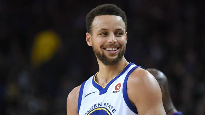 Steph Curry laughs.