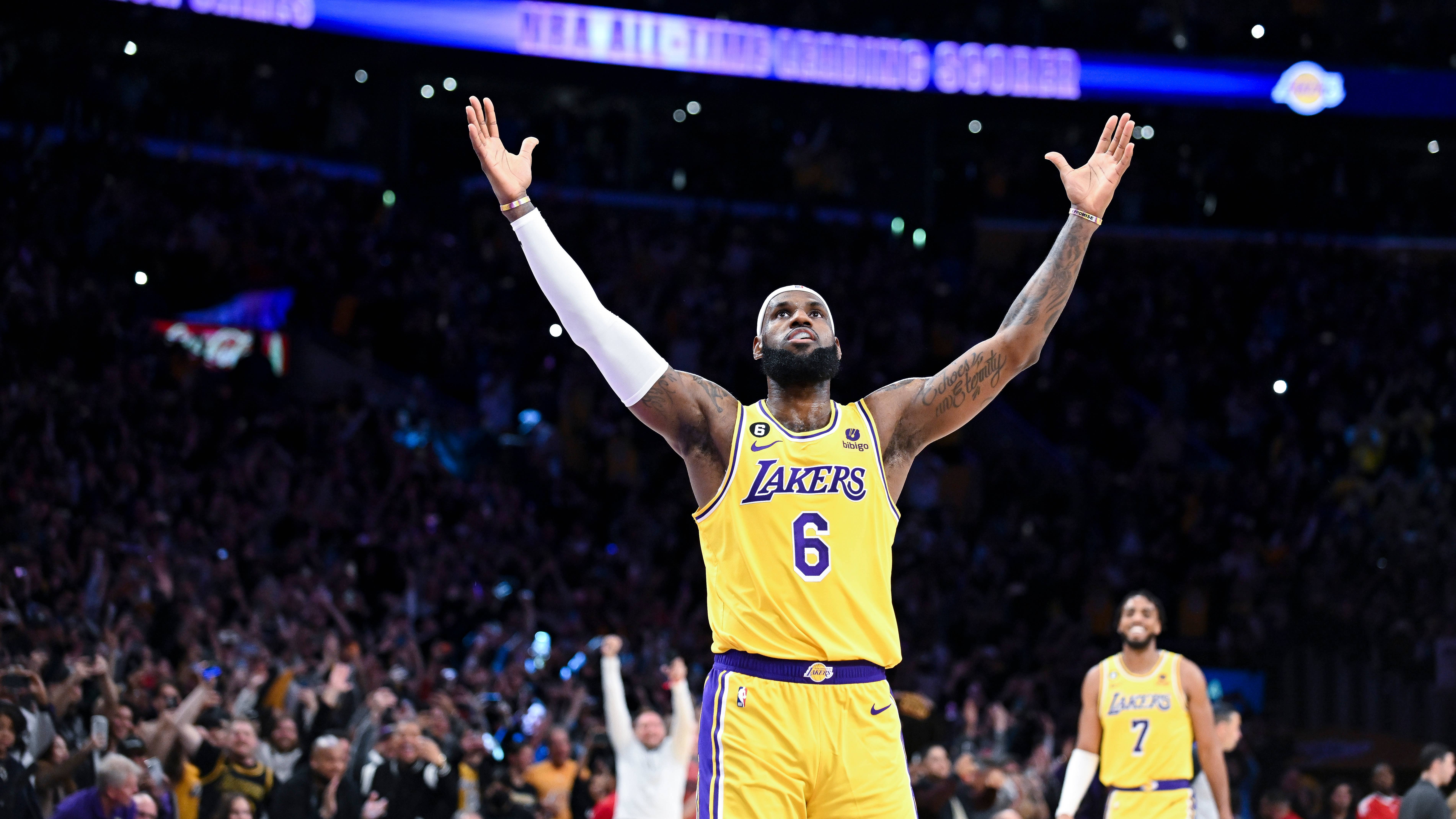 LeBron James celebrates passing Kareem Abdul Jabbar for the all time NBA scoring record