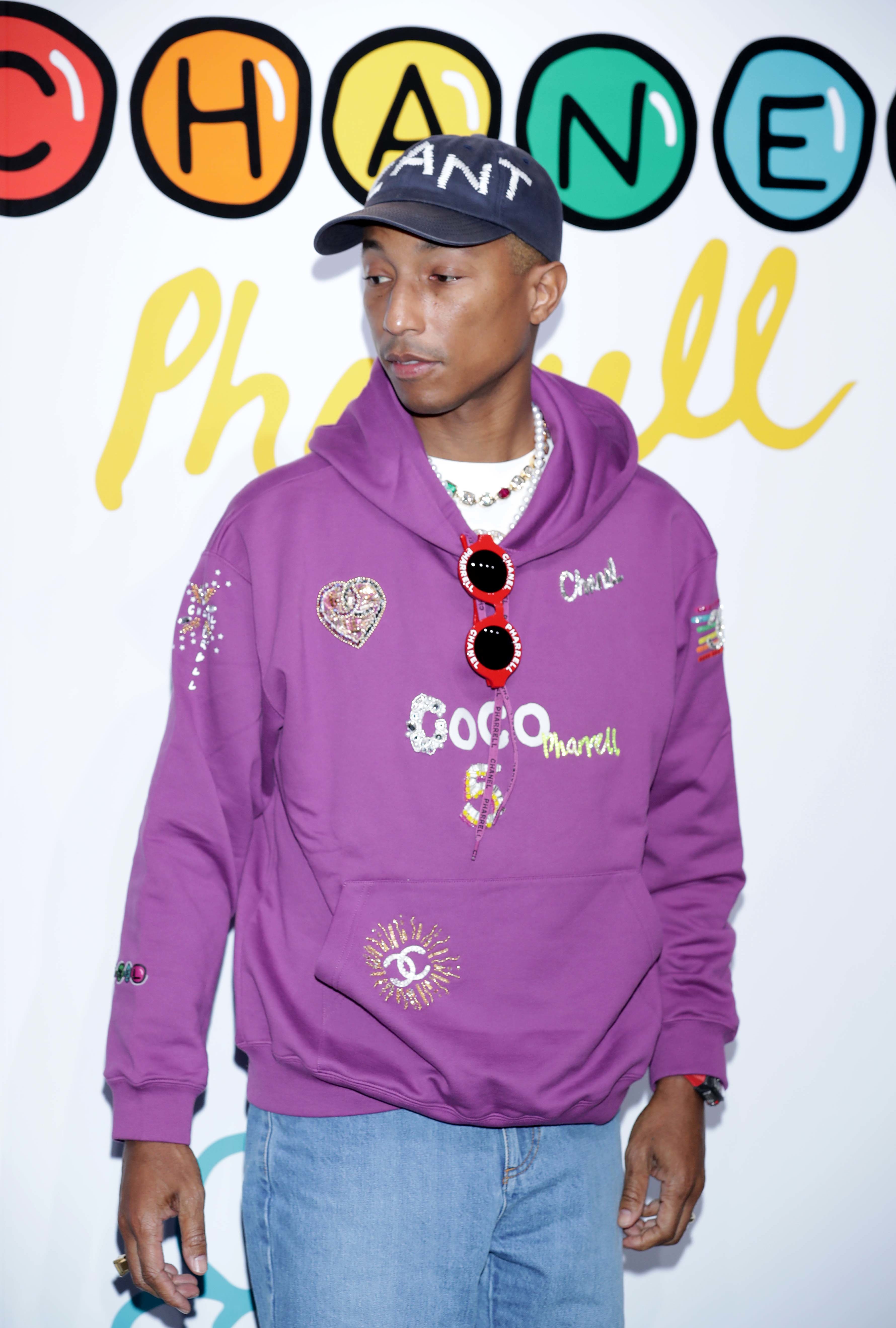 Virgil Abloh wears a Vuitton cap, a purple Gallery Dept. hoodie News  Photo - Getty Images