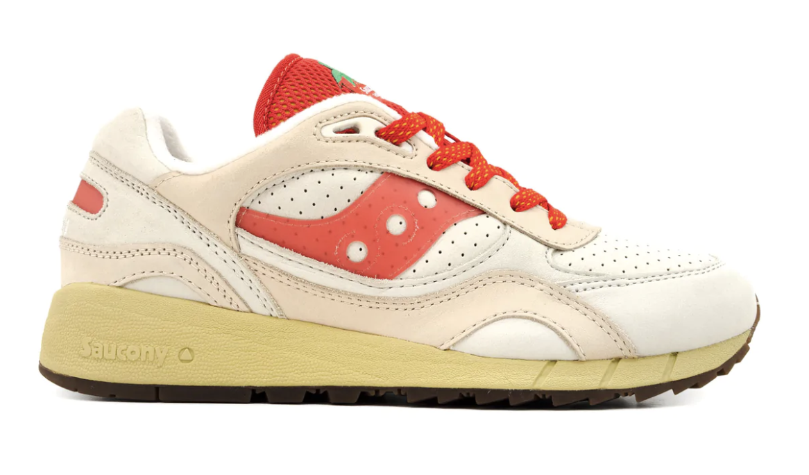The Saucony Shadow 6000 New York Cheesecake against a white background.