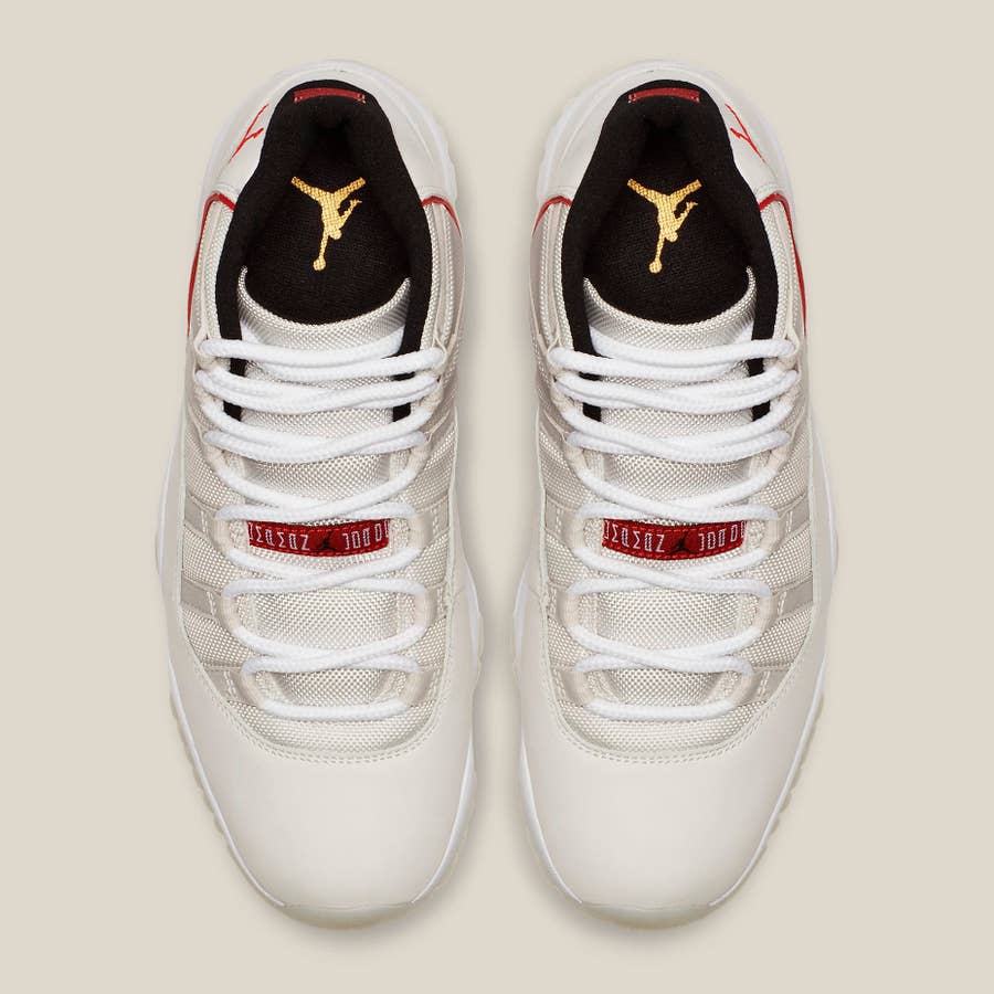 Air jordan 11 clearance platinum tint on feet