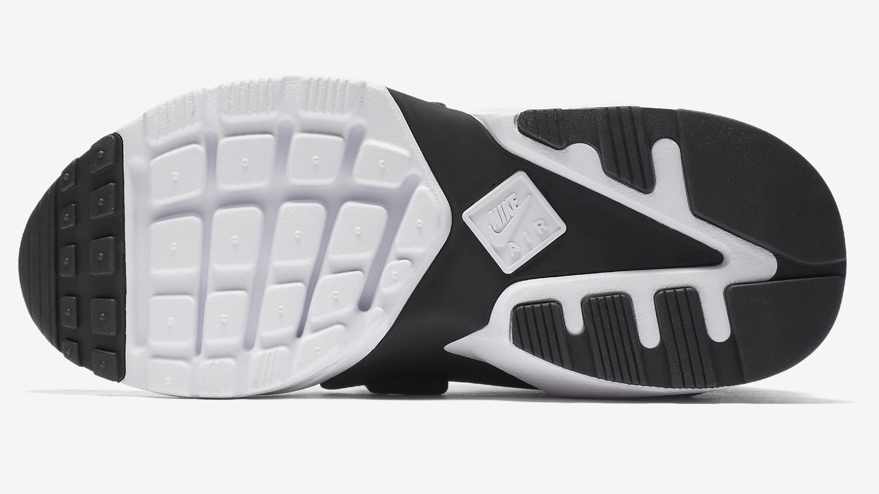Nike's New 'NYC' Huarache Wears All Black and a Slick Zip - Sneaker Freaker
