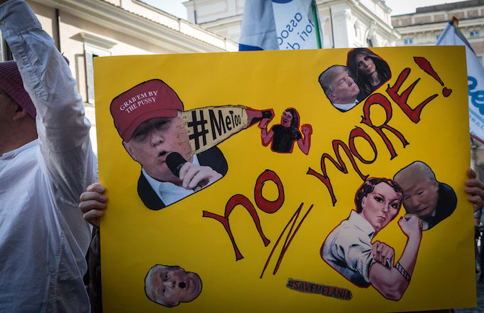 Women demonstrate against sexual harassment, violence and U.S. President Donald Trump.