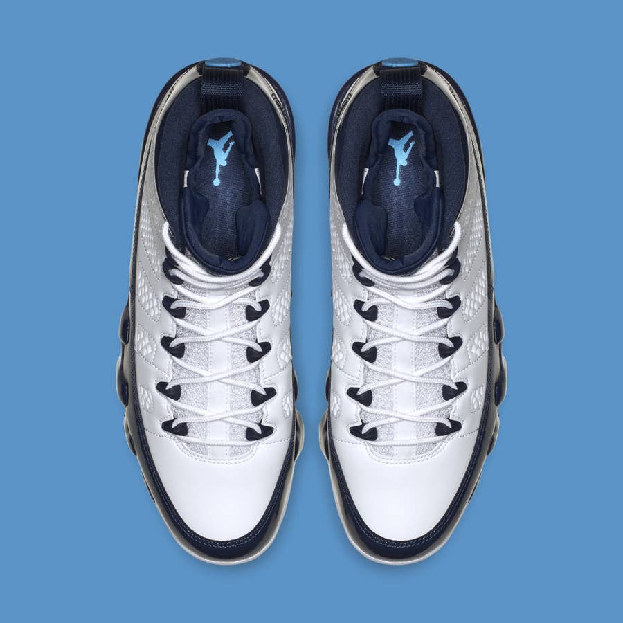 Navy blue and on sale white jordans 9