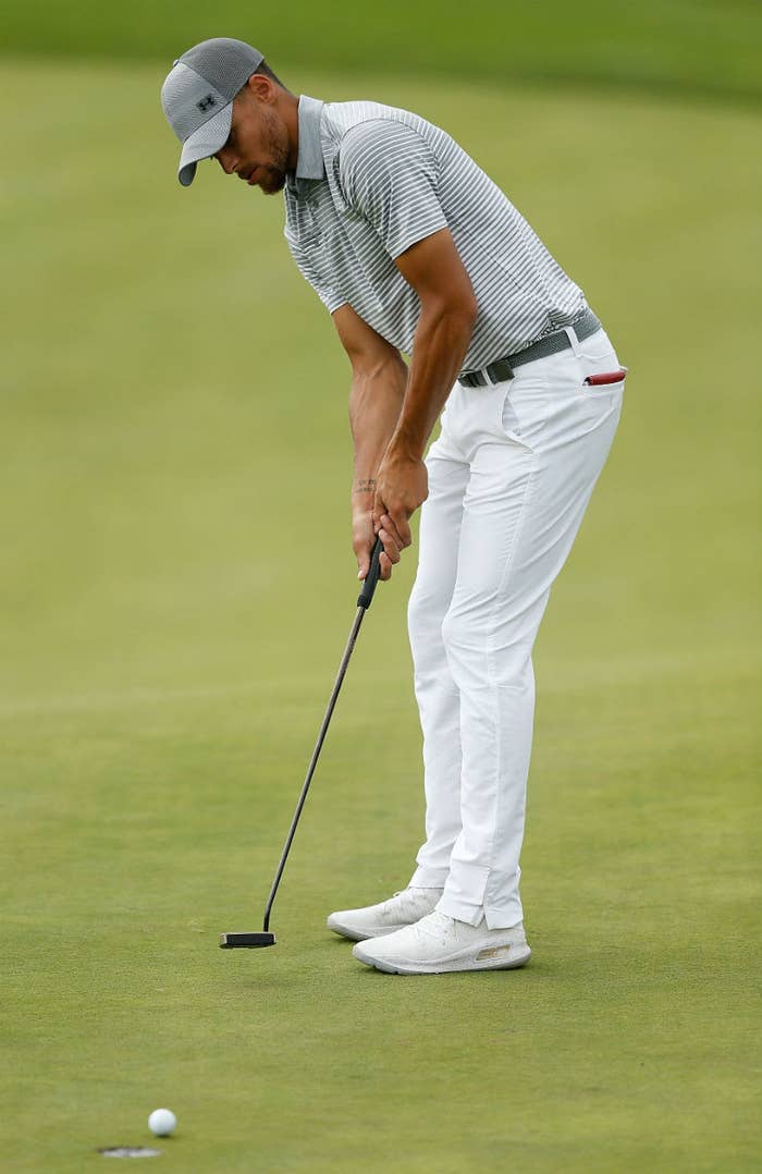 Stephen Curry Golfs in the White/Gold Under Armour Curry 4 Low (3)