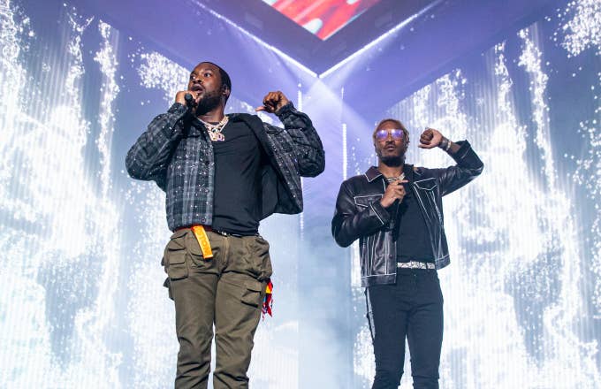 Rappers Meek Mill (L) and Future perform
