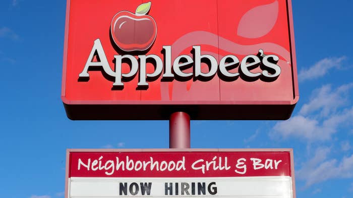 &quot;Now Hiring&quot; signs outside of an Applebee&#x27;s