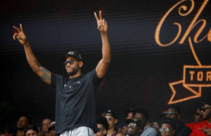 Kawhi Leonard #2 of the Toronto Raptors waves to the crowd