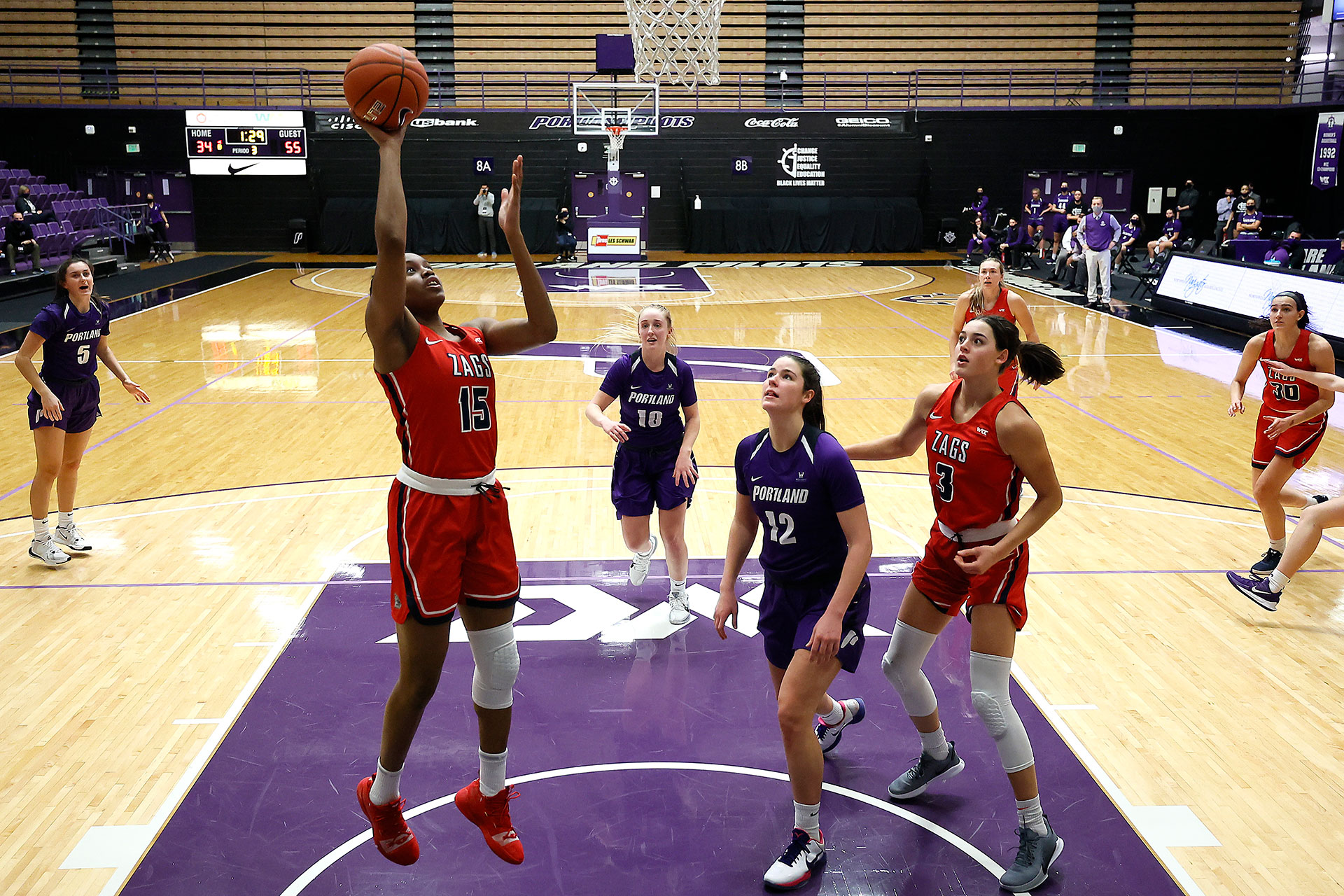 Yvonne Ejim #15 of the Gonzaga Bulldogs shoots the ball as Alex Fowler #12 of the Portland Pilots looks