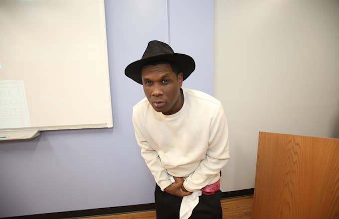 Jay Electronica poses backstage at Florida Memorial University