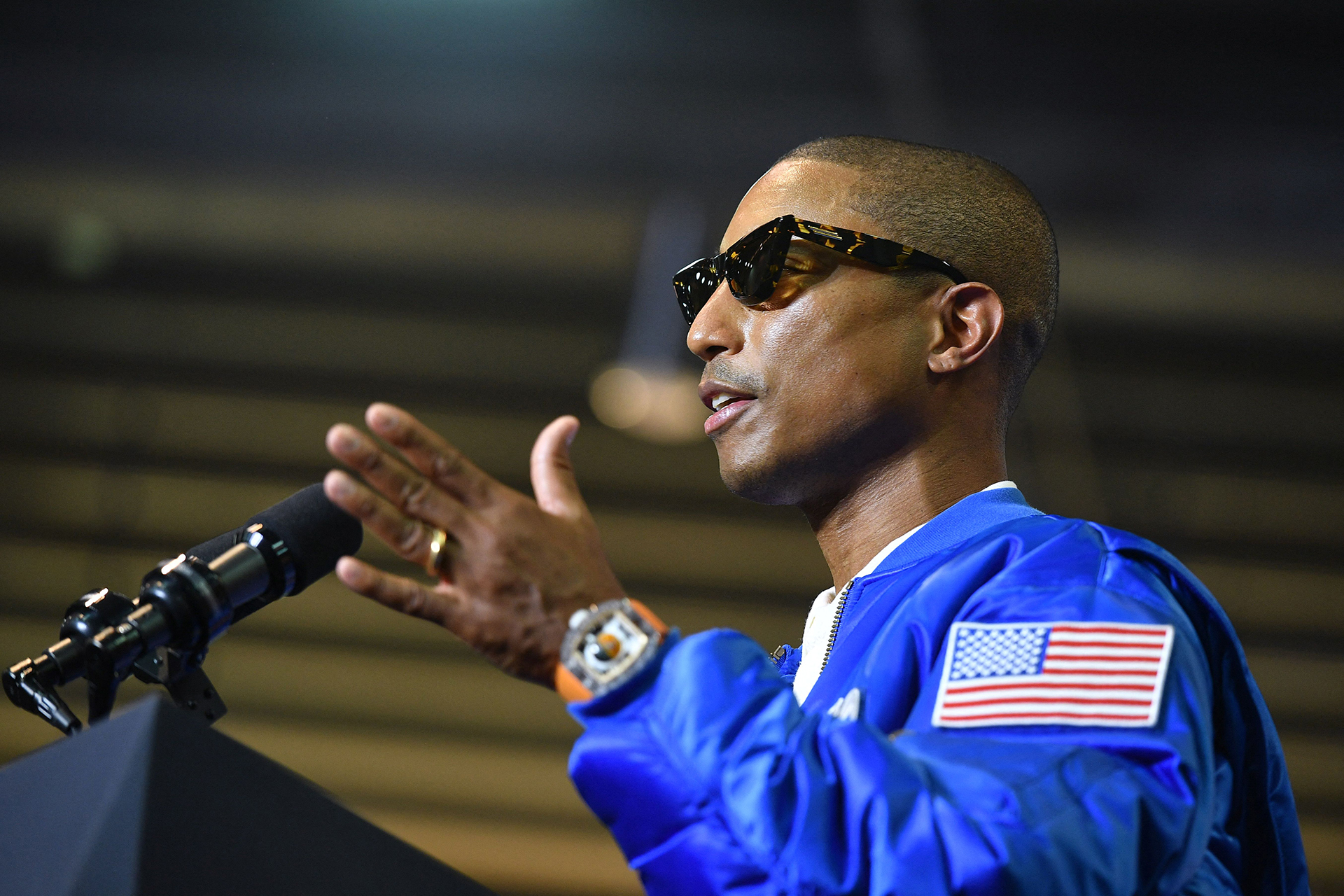 Pharrell Williams gestures as he speaks at a campaign rally for Virginia gubernatorial candidate Terry McAuliffe