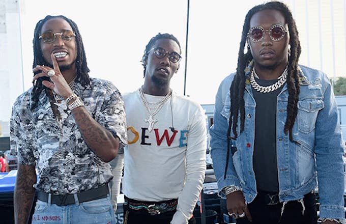 Quavo, Offset and Takeoff of Migos pose backstage during the Daytime Village.