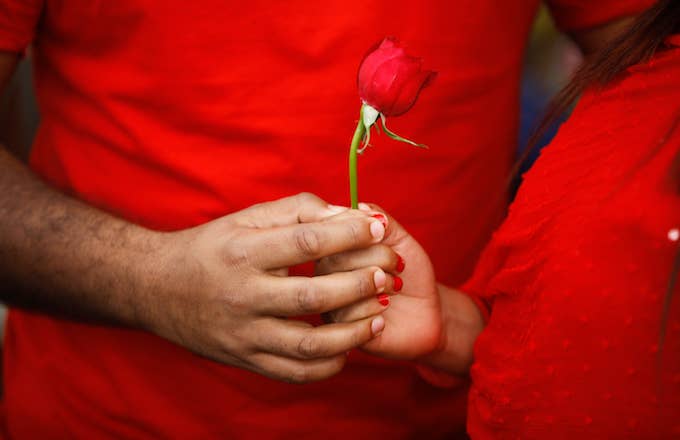 Man and woman with rose