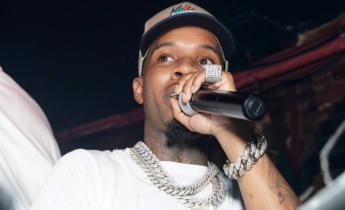 Tory Lanez with microphone in hand