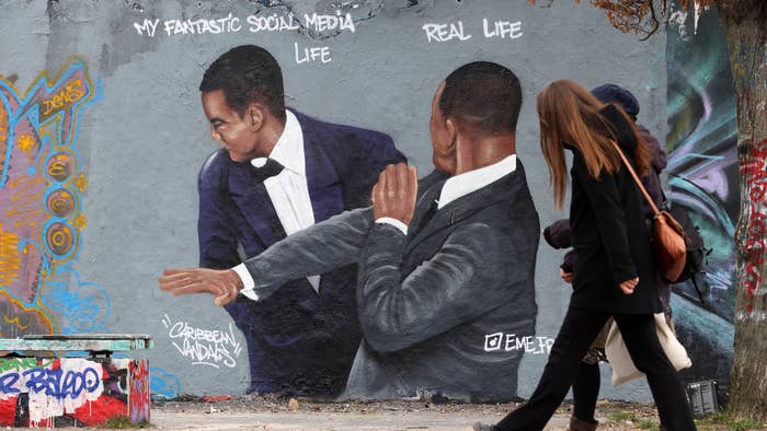Photograph of Will Smith Chris Rock meme mural