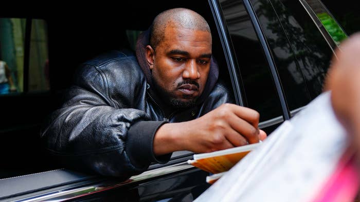 Kanye West arrives at the Balenciaga show