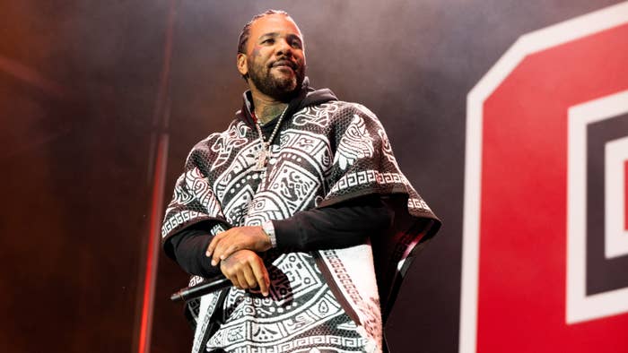 The Game is seen performing at a festival