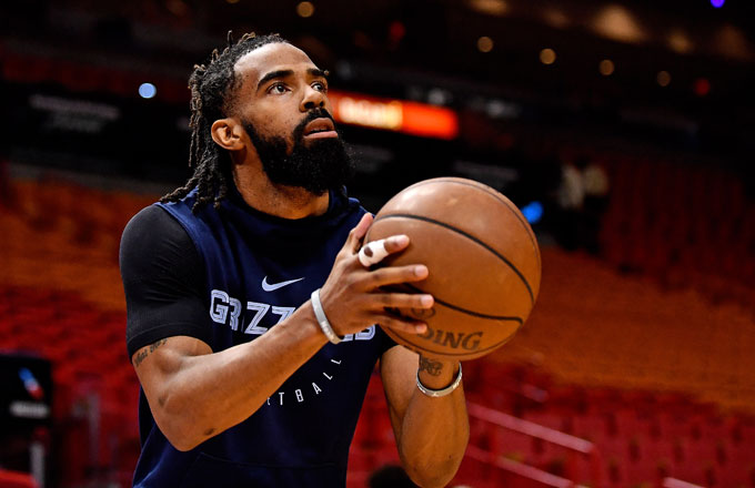 Mike Conley practices his shot.