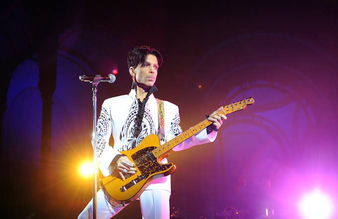 Prince performs at concert.