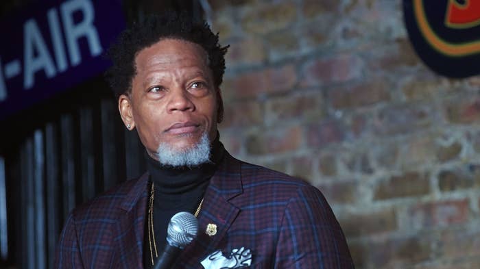 D.L. Hughley seen performing at comedy club.