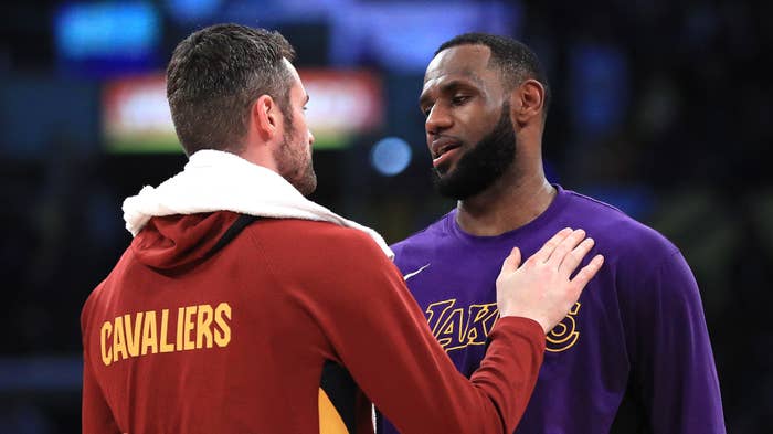 Kevin Love hugs LeBron James after a game at Staples Center.