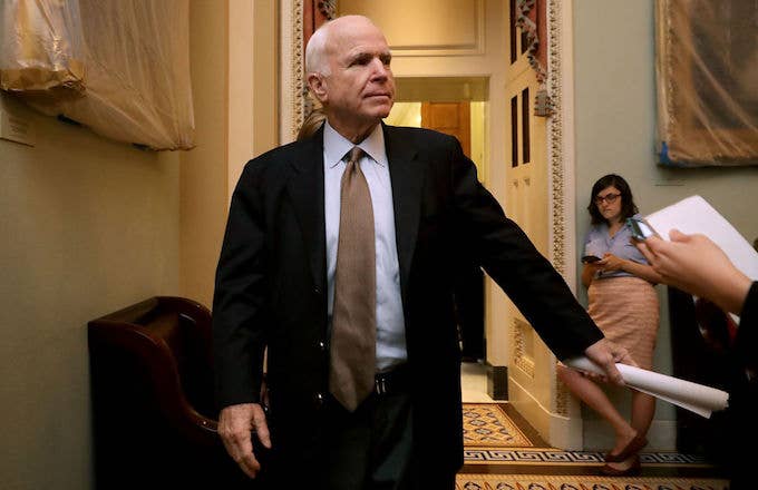 Sen. John McCain (R AZ) leaves a meeting of GOP senators