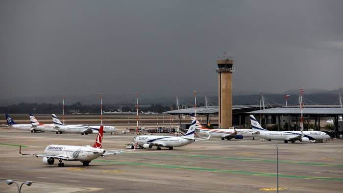This picture taken on December 21, 2021 shows a view of aircraft at Israel&#x27;s Ben Gurion Airport in Lod, east of Tel Aviv