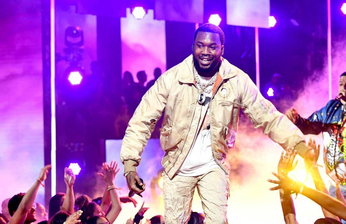 Meek Mill and DJ Khaled perform onstage at the 2019 BET Awards