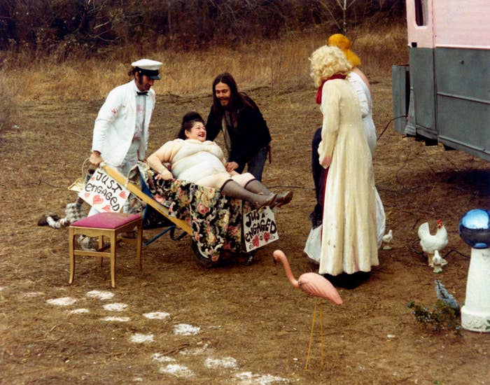 Paul Swift carrying Edith Massey on a barrow in the film &#x27;Pink Flamingos&#x27;