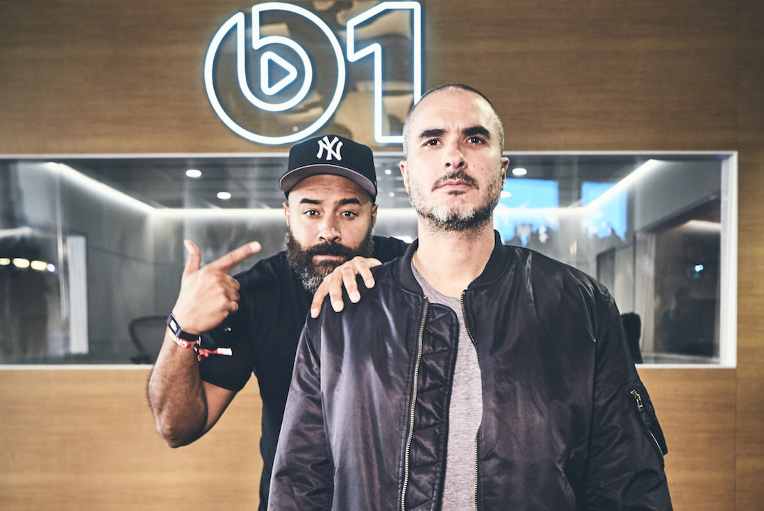 Ebro Darden and Zane Lowe in front of Apple Music&#x27;s Beats 1 Booth at ComplexCon.