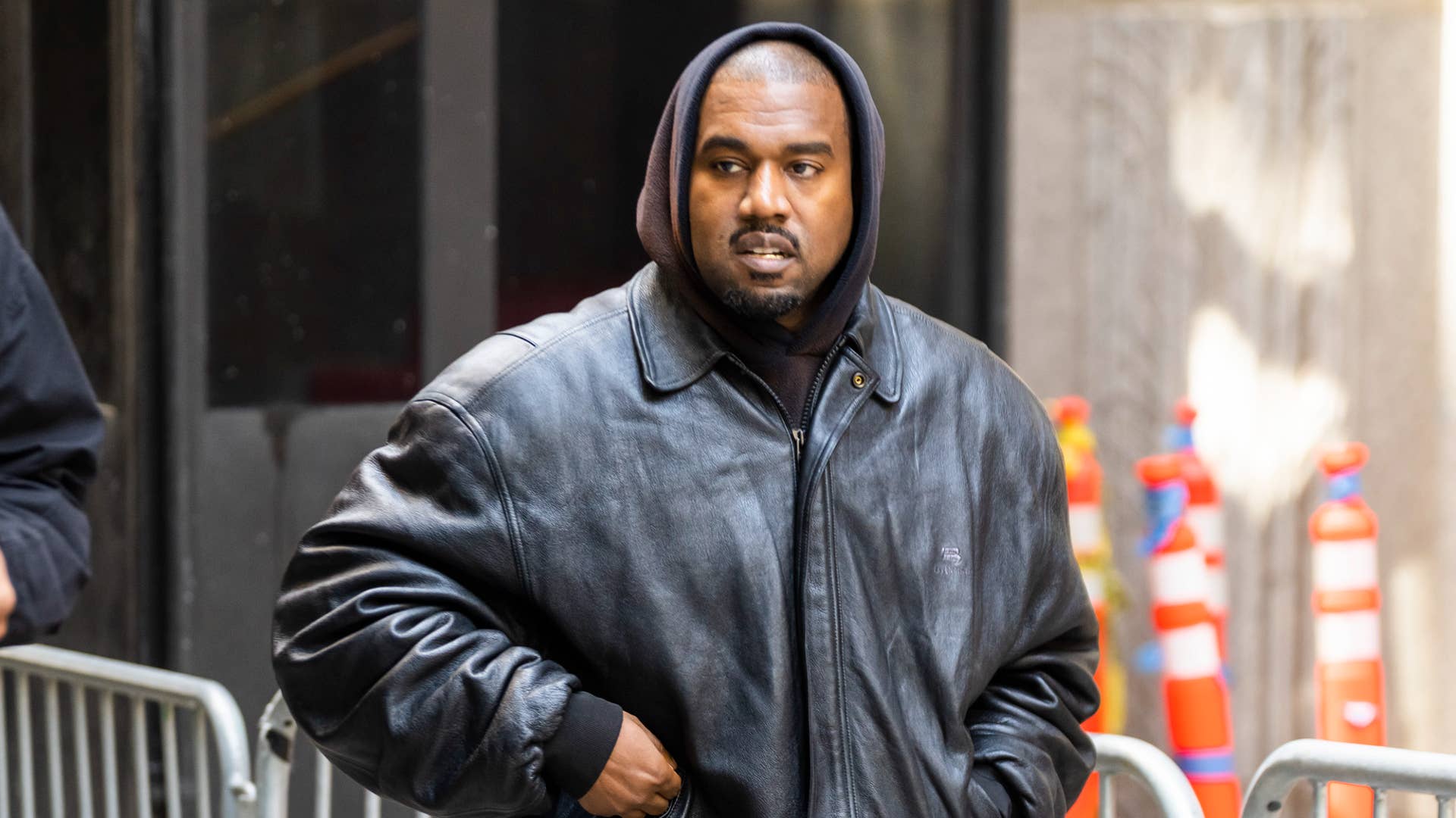 Ye is seen wearing a leather jacket