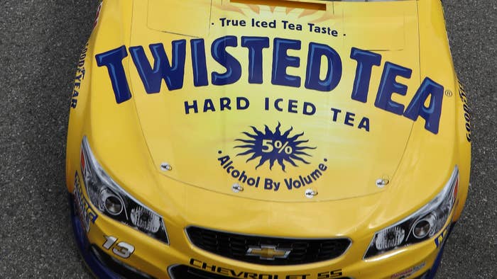 Ty Dillon, driver of the #13 Twisted Tea Chevrolet, drives through the garage during practice.
